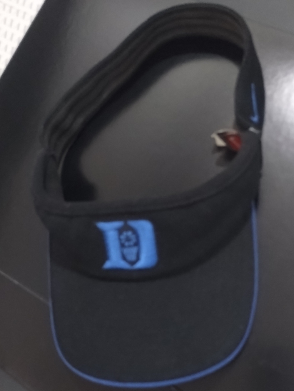 Nike Duke Black Visor with Light Blue 'D' Logo